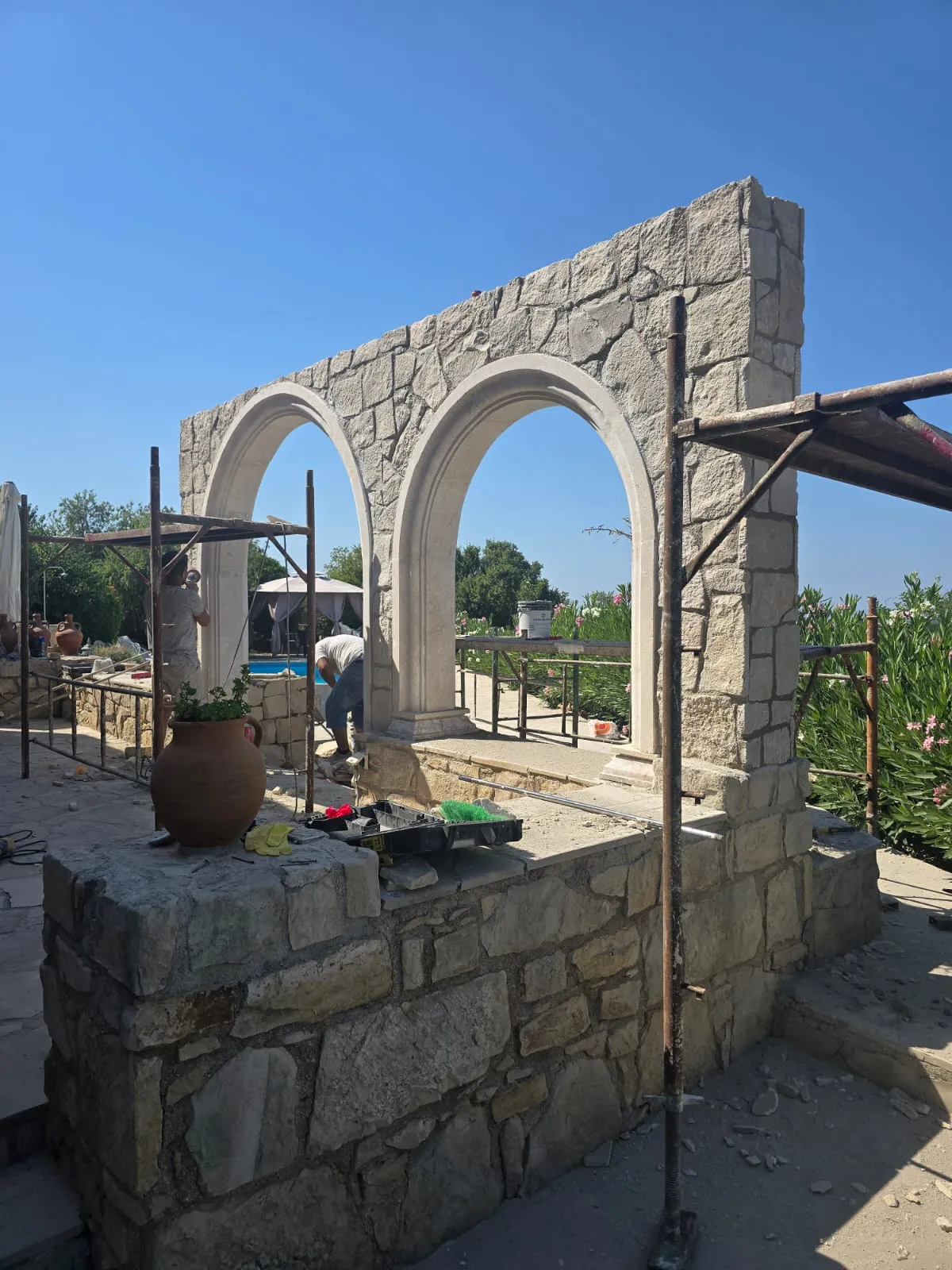 Stone archway under construction in a Cyprus garden
